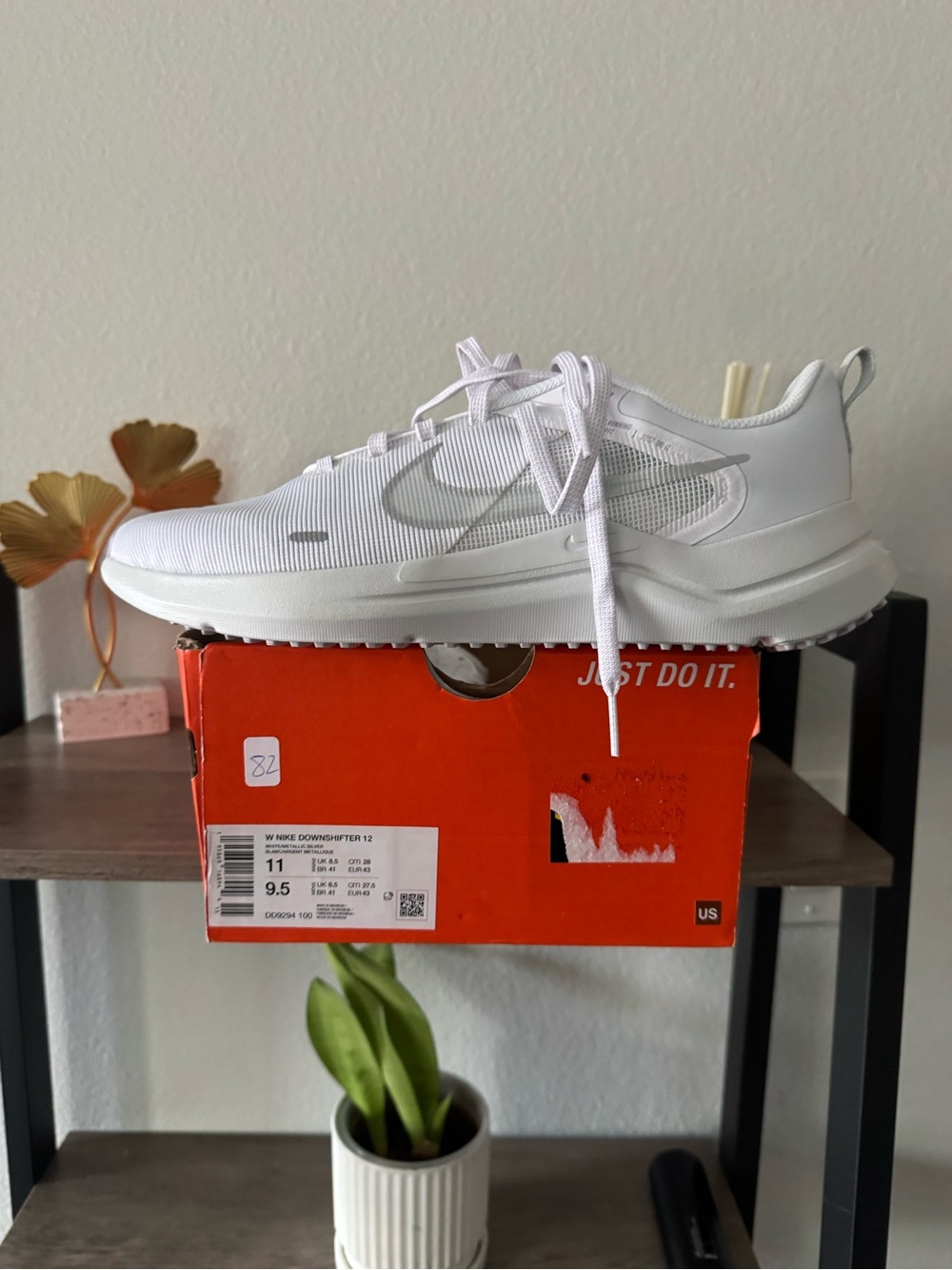 Nike White Low-Top Mesh Sneaker with Silver Swoosh